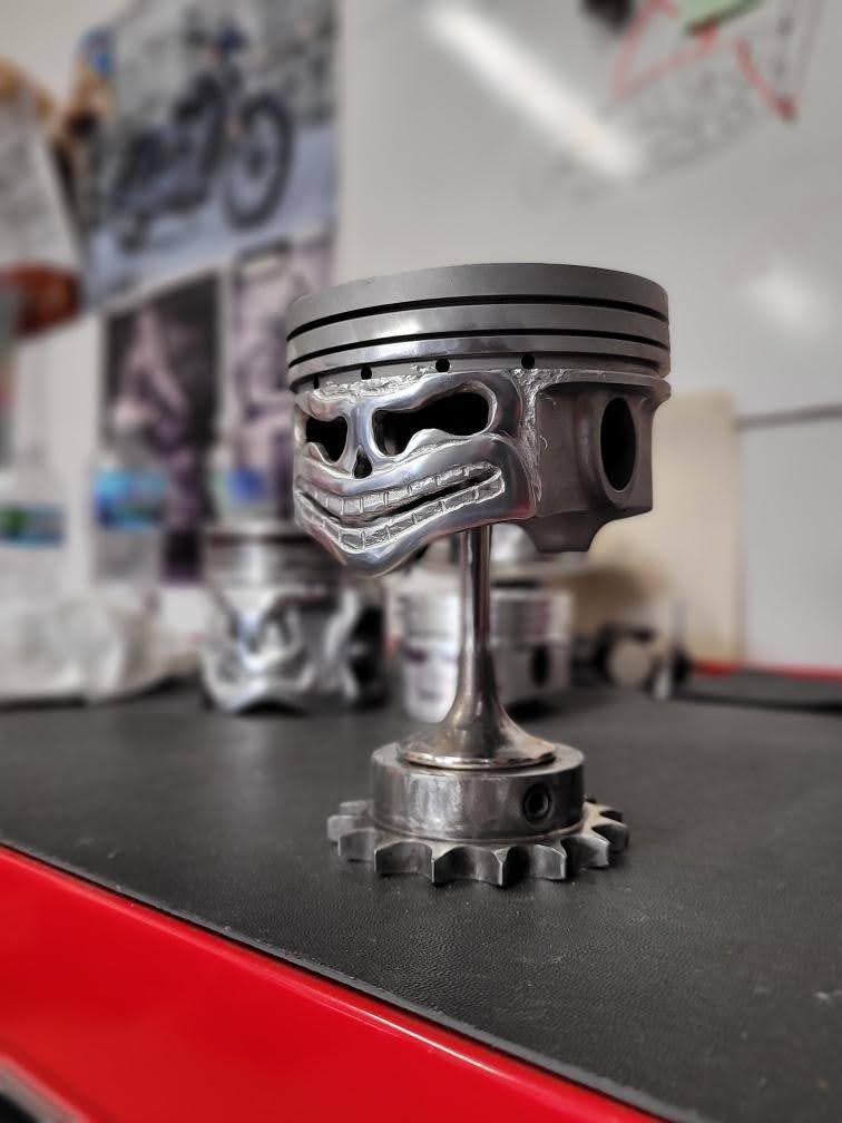 Smiling V8 Piston