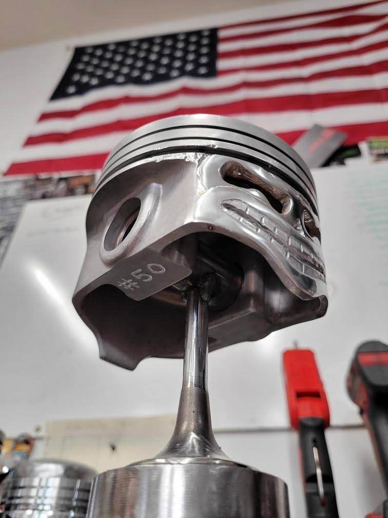 Smiling V8 Piston